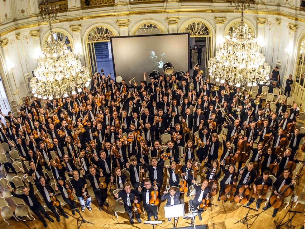 300 participants celebrating after their performance