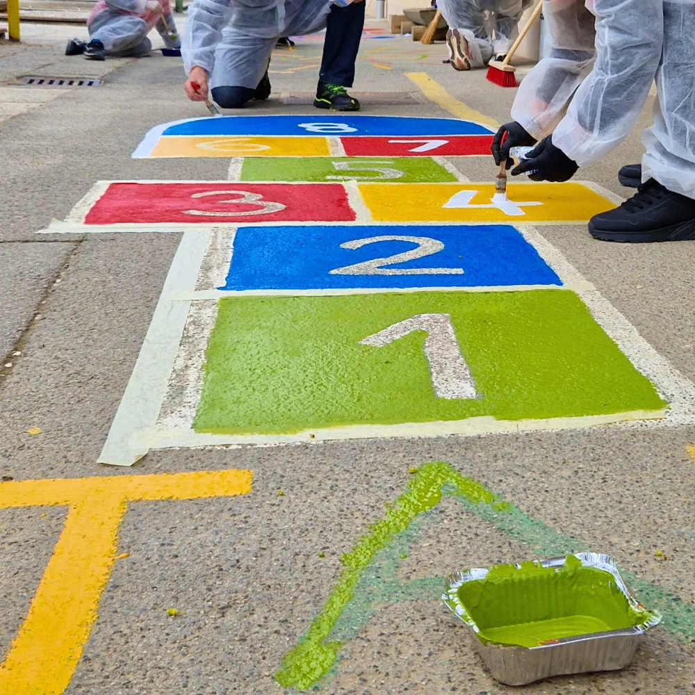 Team building participants painting kids games